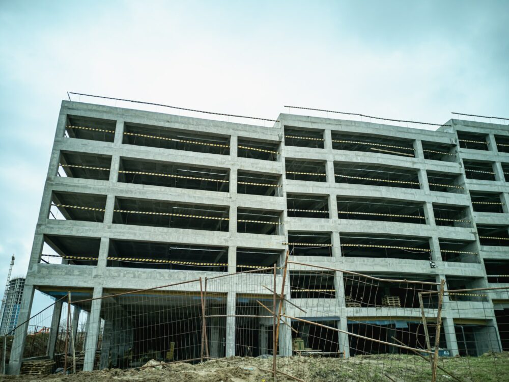 Construction of a multi-level parking for cars. Monolithic concrete structure.