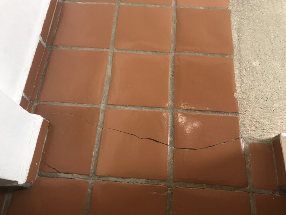 There is a crack in the red brick from an earthquake